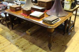 Victorian mahogany dining table on turned fluted legs,