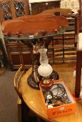 Figural glass topped coffee table, gilt framed plaque, two wall shelves,