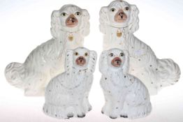 Two pair of Victorian Staffordshire dogs