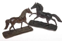 Two resin horse sculptures