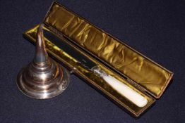 Cased mother-of-pearl handled cake knife and Sheffield plate wine funnel (2)