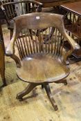 Early 20th Century oak spindle back swivel desk chair