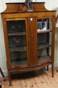 Edwardian inlaid mahogany serpentine front two door china cabinet, 171.