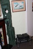 Collection of fishing gear including seven rods, reels, landing net, tackle box,