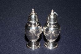 Pair late Victorian silver pepperettes by Walker and Hall,