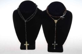 Two rosary bead crucifixes