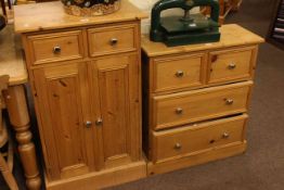 Pine two door cupboard and similar pine four drawer chest (2)