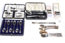 Tray lot with silver teaspoons, napkin rings,