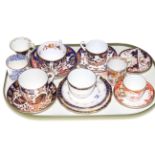 Collection of Royal Crown Derby cups and saucers