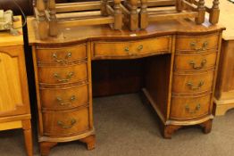 Bevan & Funnell serpentine shaped front mahogany nine drawer pedestal desk and brass telescopic
