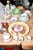 Floral encrusted basket and pair of chamber sticks, various cups and saucers, Aynsley plate,