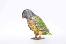 A COLD PAINTED BRONZE INKWELL IN THE FORM OF A PARROT, the head hinged,