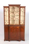 ROBSON, NEWCASTLE UPON TYNE A GEORGE III STYLE MAHOGANY BREAKFRONT CABINET,