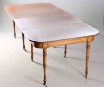 AN EARLY 19TH CENTURY MAHOGANY DINING TABLE, each end with rounded corners,
