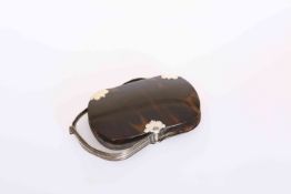 A GEORGE III SILVER MOUNTED TORTOISESHELL MAGNIFYING GLASS, circa 1900,