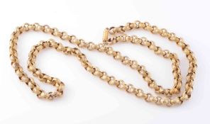 A 19TH CENTURY PINCHBECK CHAIN, of interlocking circular links with textured metal detailing,