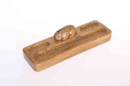 PETER HEAP OF WETWANG A RABBITMAN OAK PEN TRAY, rectangular, with carved rabbit signature. 22.