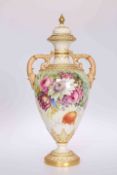 A ROYAL WORCESTER FLORAL DECORATED TWO-HANDLED VASE AND COVER, CIRCA 1905,