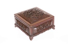 A GOOD CHINESE CARVED HARDWOOD BOX, square section,