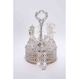 AN ELKINGTON & CO SILVER-PLATED SIX-BOTTLE CRUET, circular with pierced sides, date letter for 1859.