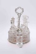 AN ELKINGTON & CO SILVER-PLATED SIX-BOTTLE CRUET, circular with pierced sides, date letter for 1859.