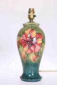 WALTER MOORCROFT A HIBISCUS PATTERN TABLE LAMP, of baluster form,