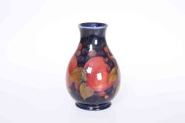 A WALTER MOORCROFT POMEGRANATE VASE, of baluster form,