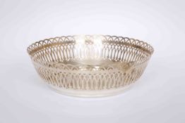 AN ERCUIS SILVER-PLATED BOWL, circular with lattice sides. 20.