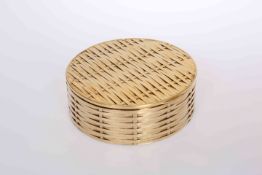 AN ITALIAN SILVER GILT BASKET WEAVE BOX, circular with hinged cover, engraved "50" 1972 to the base,