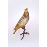 A LARGE COLD PAINTED BRONZE OF A COCKATOO, perched on a branch, bears B in a vase mark,