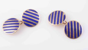 A PAIR OF GOLD AND ENAMEL CUFFLINKS, each circular plaque set with blue striped enamelling,