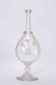 A 19TH CENTURY GLASS FLASK IN THE FORM OF BELLOWS, with circular foot and Prince of Wales feathers.