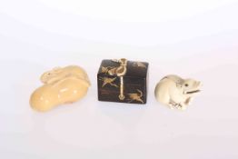 A JAPANESE LACQUER AND IVORY NETSUKE, in the form of a box with lift-off cover, gilded with cranes,