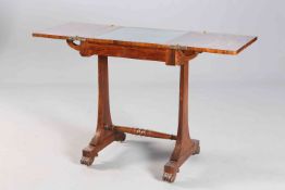 AN EARLY 19TH CENTURY ROSEWOOD WRITING TABLE,