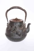 A JAPANESE TETSUBIN (IRON TEA KETTLE), MEIJI PERIOD, the swing handle issuing from two cast crabs,