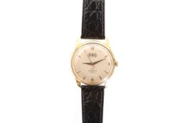 A LEMANIA TROY GOLD CASED WRISTWATCH, circular dial with centre sweep seconds and arrow hands.