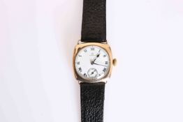 AN ART DECO PERIOD OMEGA 9 CARAT GOLD GENTLEMAN'S CUSHION SHAPED WRISTWATCH,