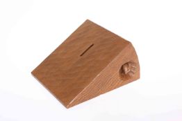 ROBERT THOMPSON OF KILBURN A RARE MOUSEMAN OAK MONEY BOX, in the form of a wedge of cheese,