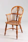 A 19TH CENTURY OAK AND ELM CHILD'S WINDSOR CHAIR, with pierced splat and crinoline stretcher.