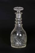 A GEORGIAN CUT-GLASS DECANTER, with facet cut triple ring neck. 25.