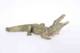 A COLD PAINTED BRONZE OF A CROCODILE,