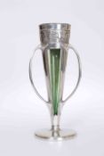 ARCHIBALD KNOX FOR LIBERTY & CO A TUDRIC PEWTER THREE-HANDLED VASE, number 0957,