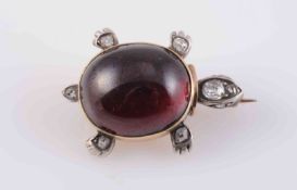 A MID VICTORIAN GARNET AND DIAMOND BROOCH, modelled as a turtle,