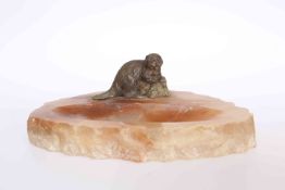 A RARE COLD PAINTED BRONZE BEAVER MOUNTED ON A SOAPSTONE ASHTRAY,