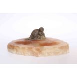 A RARE COLD PAINTED BRONZE BEAVER MOUNTED ON A SOAPSTONE ASHTRAY,