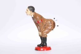 A NOVELTY HITLER PAINTED CAST METAL FIGURAL PIN CUSHION,