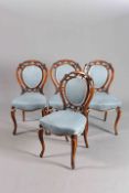 A SET OF FOUR VICTORIAN WALNUT AND UPHOLSTERED DRAWING ROOM CHAIRS,