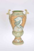 A DERUTA SGRAFFITO VASE, of pedestal form with twin handles, each side with a portrait of a maiden,