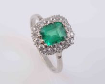 A COLOMBIAN EMERALD AND DIAMOND RING,