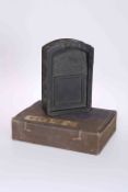 A CHINESE CARVED SLATE INKSTONE, the rectangular tablet with arch top, carved with characters,